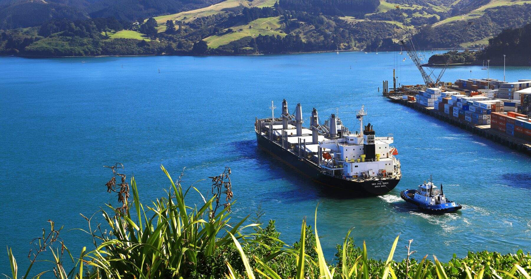 Cargo vessel entering a port terminal
